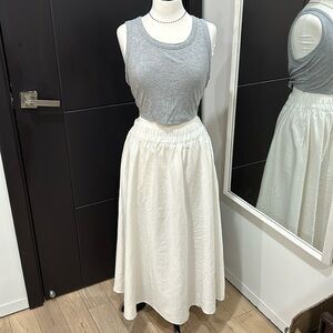 White long skirt. Has pockets. Size small.